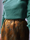 Gonna jacquard dorata