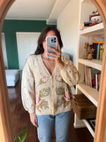Cardigan crema con fiori