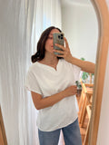 T-shirt bianca con rose