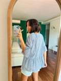 Blusa a righe con balza