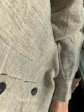 Camicia grigia con tasche