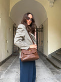 Borsa marrone con dettagli stampa cocco