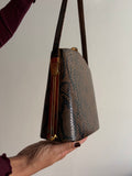 Borsa rigida rettile