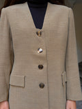 Giacca beige con scollo particolare