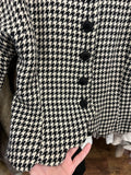 Giacca pied de poule con bordo ondulato