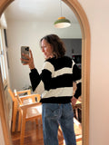 Pullover a righe bianche