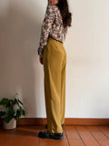 Pantalone con pince miele