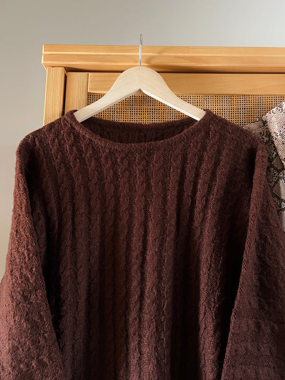 Maglione marrone trecce