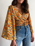 Camicia incrociata fiori arancioni