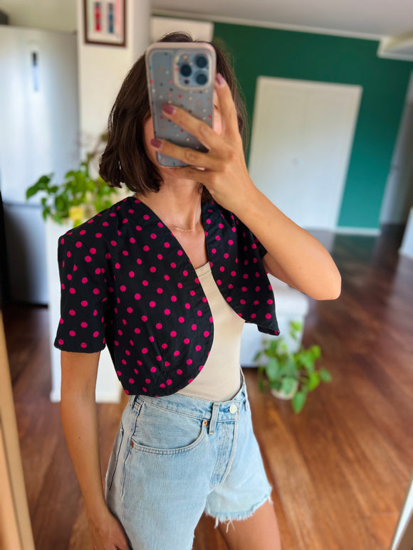 Bolerino a pois fuxia