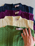 Top con bottoni in maglia di cotone pistacchio