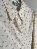 Camicia a fiorellini lilla e azzurri