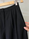 Pantalone sartoriale con le pince lana nera rigata