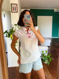 Camicetta con scollo orientale