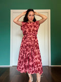 Abito con cintura lungo senza maniche fiorato rosa e bordeaux