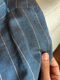 Pantalone sartoriale con le pince lino righe