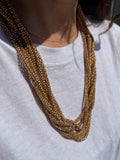 Collana dorata con tanti fili