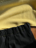 Gilet corto giallo pastello