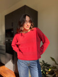 Maglione righe traforate • fragola