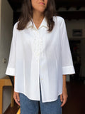 Camicia bianca con rouche