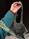 Maxi borsa trapuntata in velluto • verde leopardi