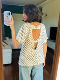 Maglietta schiena nuda bianca pois