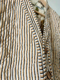 Giacca trapuntata double-face • modello cardigan • fantasia base panna