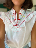 Camicetta con scollo orientale