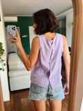 Top lilla con bottoni dietro