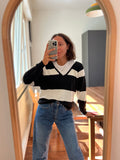 Pullover a righe bianche