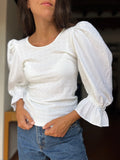 Blusa bianca con maniche a sbuffo 2