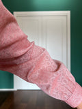 Camicia rosa semitrasparente