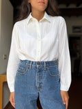 Camicia bianca ricamini