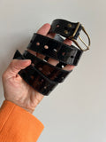 Cintura nera di vernice