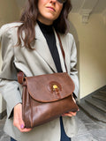 Borsa marrone con dettagli stampa cocco