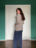 Lupetto beige con bottoni applicati