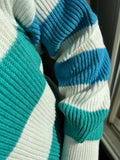 Maglione a righe azzurre e verdi