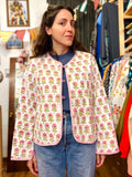 Giacca trapuntata double-face • modello senza collo • bianca fiori rosa