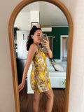 Abito corto fiorato giallo