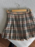 Mini gonna a pieghe tartan tipo Burberry