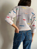 Maglione bianco righe colorate