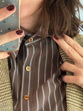 Camicia marrone a righe