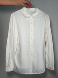 Camicia bianca con colletto tondo ricamato
