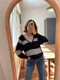 Pullover a righe grigie