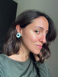 Orecchini clip fiore turchese