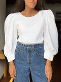 Blusa bianca con maniche a sbuffo 1
