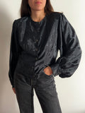 Camicia nera foglie