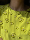 Blusa lime con margherite