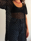 Maglia crochet nera lunga