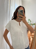 T-shirt bianca con lavorazione